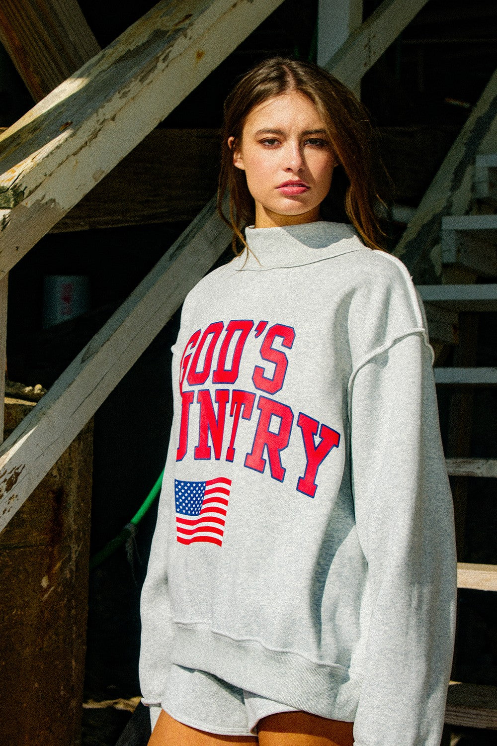 BUCKET LIST Women's Top God's Country Reversible Mock-neck Sweatshirt